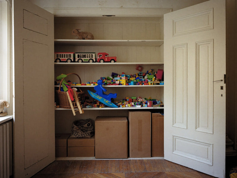A family closet crammed with toys that stopped being played with